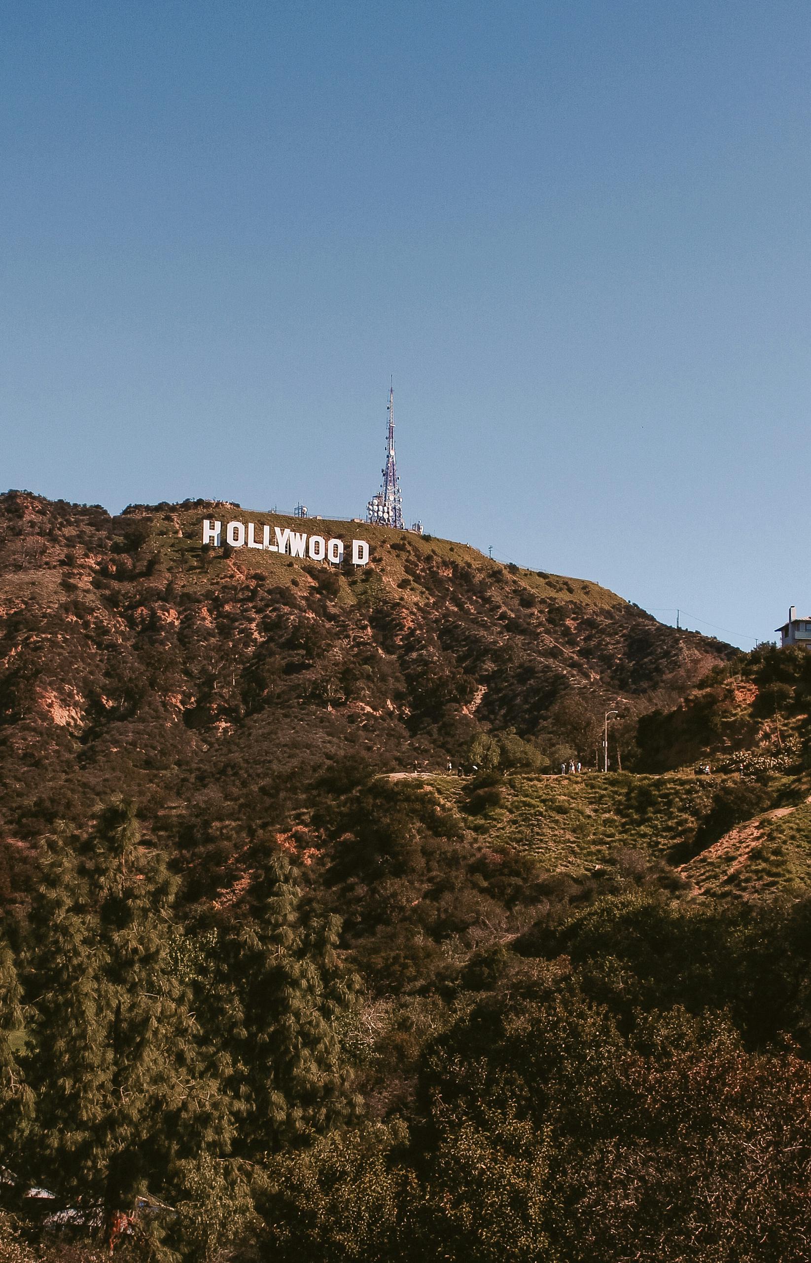 Hollywood Sign on Brown Rocky Mountain Under Blue Sky